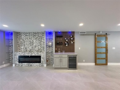 Beautifully renovated 2-bedroom, 2-bath first-floor corner unit on Wynmoor Golf Course in Florida - for sale on GolfHomes.com, golf home, golf lot