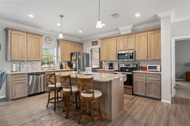 This beautifully maintained 3-bedroom, 2-bath home sits on a on Brookridge Country Club in Florida - for sale on GolfHomes.com, golf home, golf lot