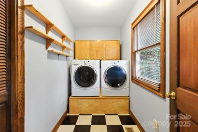 Nestled on a peaceful hilltop, this spacious 3-bedroom on Black Mountain Golf Course in North Carolina - for sale on GolfHomes.com, golf home, golf lot