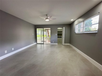 Beautifully renovated 2-bedroom, 2-bath first-floor corner unit on Wynmoor Golf Course in Florida - for sale on GolfHomes.com, golf home, golf lot