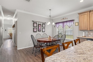 This beautifully maintained 3-bedroom, 2-bath home sits on a on Brookridge Country Club in Florida - for sale on GolfHomes.com, golf home, golf lot