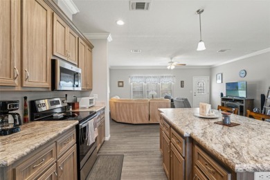 This beautifully maintained 3-bedroom, 2-bath home sits on a on Brookridge Country Club in Florida - for sale on GolfHomes.com, golf home, golf lot