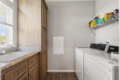 This beautifully maintained 3-bedroom, 2-bath home sits on a on Brookridge Country Club in Florida - for sale on GolfHomes.com, golf home, golf lot