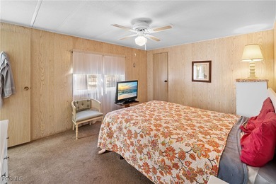 A great example of an affordable, well-cared-for, property in on Six Lakes Country Club in Florida - for sale on GolfHomes.com, golf home, golf lot