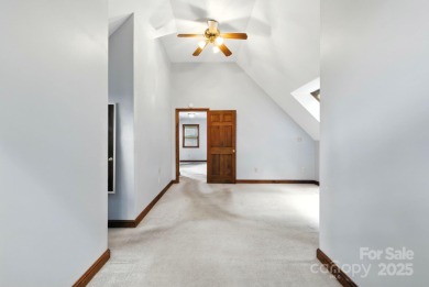 Nestled on a peaceful hilltop, this spacious 3-bedroom on Black Mountain Golf Course in North Carolina - for sale on GolfHomes.com, golf home, golf lot