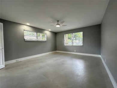 Beautifully renovated 2-bedroom, 2-bath first-floor corner unit on Wynmoor Golf Course in Florida - for sale on GolfHomes.com, golf home, golf lot