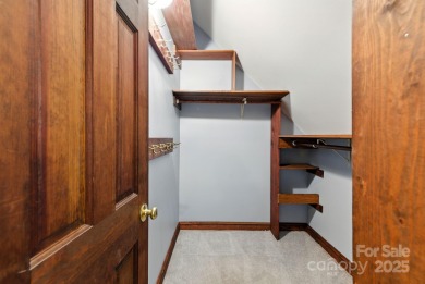 Nestled on a peaceful hilltop, this spacious 3-bedroom on Black Mountain Golf Course in North Carolina - for sale on GolfHomes.com, golf home, golf lot