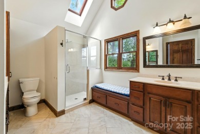 Nestled on a peaceful hilltop, this spacious 3-bedroom on Black Mountain Golf Course in North Carolina - for sale on GolfHomes.com, golf home, golf lot