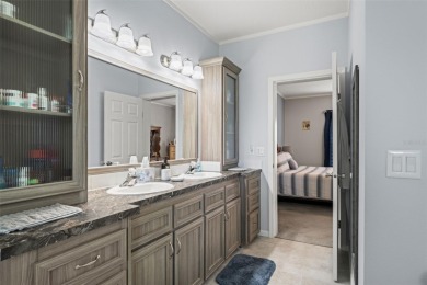 This beautifully maintained 3-bedroom, 2-bath home sits on a on Brookridge Country Club in Florida - for sale on GolfHomes.com, golf home, golf lot