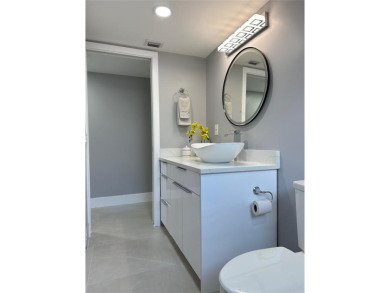 Beautifully renovated 2-bedroom, 2-bath first-floor corner unit on Wynmoor Golf Course in Florida - for sale on GolfHomes.com, golf home, golf lot