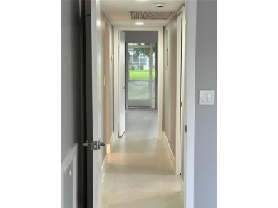 Beautifully renovated 2-bedroom, 2-bath first-floor corner unit on Wynmoor Golf Course in Florida - for sale on GolfHomes.com, golf home, golf lot