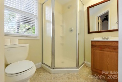 Nestled on a peaceful hilltop, this spacious 3-bedroom on Black Mountain Golf Course in North Carolina - for sale on GolfHomes.com, golf home, golf lot