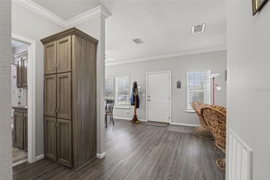 This beautifully maintained 3-bedroom, 2-bath home sits on a on Brookridge Country Club in Florida - for sale on GolfHomes.com, golf home, golf lot