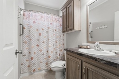 This beautifully maintained 3-bedroom, 2-bath home sits on a on Brookridge Country Club in Florida - for sale on GolfHomes.com, golf home, golf lot