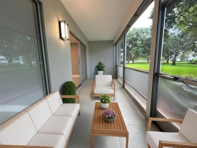 Beautifully renovated 2-bedroom, 2-bath first-floor corner unit on Wynmoor Golf Course in Florida - for sale on GolfHomes.com, golf home, golf lot