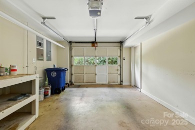 Nestled on a peaceful hilltop, this spacious 3-bedroom on Black Mountain Golf Course in North Carolina - for sale on GolfHomes.com, golf home, golf lot