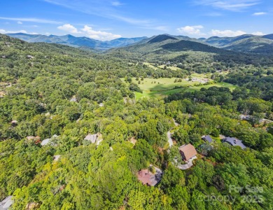 Nestled on a peaceful hilltop, this spacious 3-bedroom on Black Mountain Golf Course in North Carolina - for sale on GolfHomes.com, golf home, golf lot