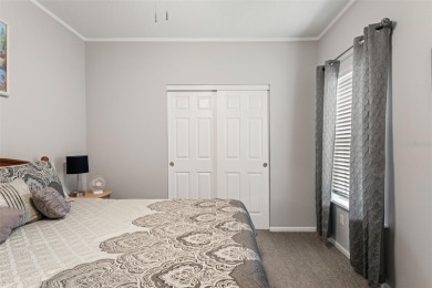 This beautifully maintained 3-bedroom, 2-bath home sits on a on Brookridge Country Club in Florida - for sale on GolfHomes.com, golf home, golf lot