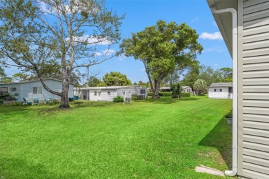 This beautifully maintained 3-bedroom, 2-bath home sits on a on Brookridge Country Club in Florida - for sale on GolfHomes.com, golf home, golf lot
