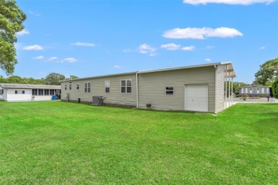 This beautifully maintained 3-bedroom, 2-bath home sits on a on Brookridge Country Club in Florida - for sale on GolfHomes.com, golf home, golf lot
