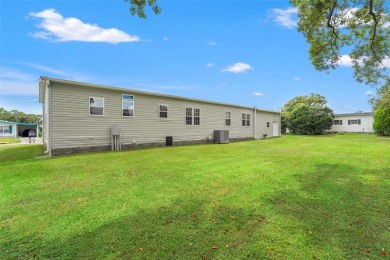This beautifully maintained 3-bedroom, 2-bath home sits on a on Brookridge Country Club in Florida - for sale on GolfHomes.com, golf home, golf lot