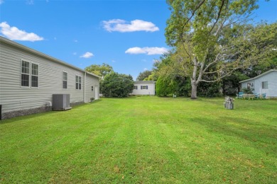 This beautifully maintained 3-bedroom, 2-bath home sits on a on Brookridge Country Club in Florida - for sale on GolfHomes.com, golf home, golf lot