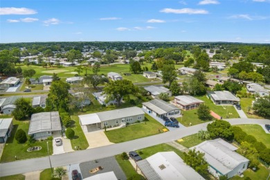 This beautifully maintained 3-bedroom, 2-bath home sits on a on Brookridge Country Club in Florida - for sale on GolfHomes.com, golf home, golf lot