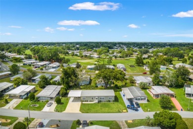 This beautifully maintained 3-bedroom, 2-bath home sits on a on Brookridge Country Club in Florida - for sale on GolfHomes.com, golf home, golf lot