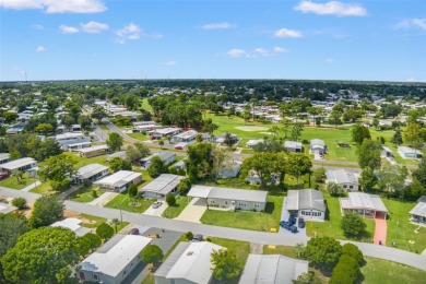 This beautifully maintained 3-bedroom, 2-bath home sits on a on Brookridge Country Club in Florida - for sale on GolfHomes.com, golf home, golf lot