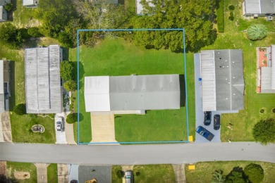 This beautifully maintained 3-bedroom, 2-bath home sits on a on Brookridge Country Club in Florida - for sale on GolfHomes.com, golf home, golf lot