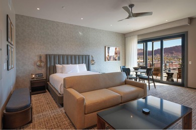 This top-floor unit has stunning Red Rock views to the East on Entrada at Snow Canyon in Utah - for sale on GolfHomes.com, golf home, golf lot