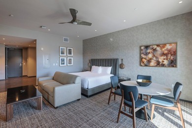 This top-floor unit has stunning Red Rock views to the East on Entrada at Snow Canyon in Utah - for sale on GolfHomes.com, golf home, golf lot