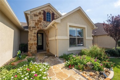 Discover the perfect blend of elegance, comfort, and on Wildhorse Golf Club of Robson Ranch in Texas - for sale on GolfHomes.com, golf home, golf lot