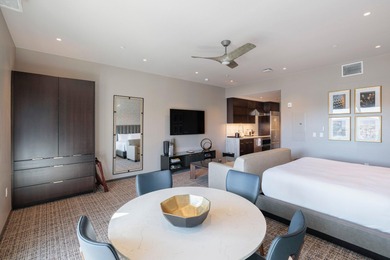 This top-floor unit has stunning Red Rock views to the East on Entrada at Snow Canyon in Utah - for sale on GolfHomes.com, golf home, golf lot