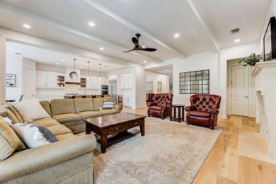 Discover refined elegance in this stunning two-story luxury home on University of Texas Golf Club in Texas - for sale on GolfHomes.com, golf home, golf lot