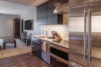 This top-floor unit has stunning Red Rock views to the East on Entrada at Snow Canyon in Utah - for sale on GolfHomes.com, golf home, golf lot