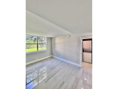 Impeccable 3BR/2BA corner unit in Palm-Aire! Completely on Palm-Aire Country Club and Resort - Palms in Florida - for sale on GolfHomes.com, golf home, golf lot