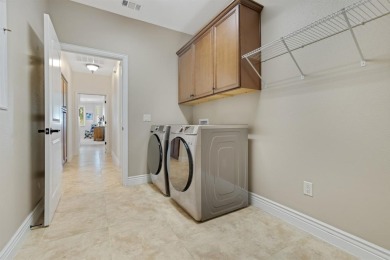 Discover the perfect blend of elegance, comfort, and on Wildhorse Golf Club of Robson Ranch in Texas - for sale on GolfHomes.com, golf home, golf lot