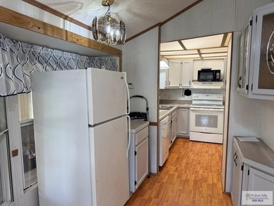 Discover the this park model in the River Bend Resort and Golf on River Bend Country Club in Texas - for sale on GolfHomes.com, golf home, golf lot