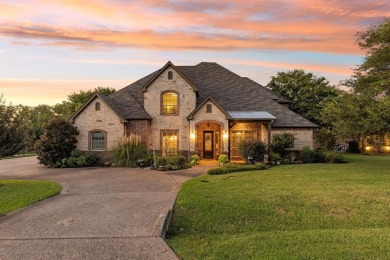 This beautifully maintained, one-owner home sits on just under on The Golf Club at Resort Eagle Mountain Lake in Texas - for sale on GolfHomes.com, golf home, golf lot