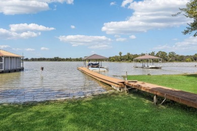 This beautifully maintained, one-owner home sits on just under on The Golf Club at Resort Eagle Mountain Lake in Texas - for sale on GolfHomes.com, golf home, golf lot