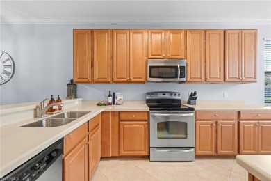 Light-Filled First Floor End Unit in Heritage Bay with FULL GOLF on Heritage Bay Golf Course in Florida - for sale on GolfHomes.com, golf home, golf lot