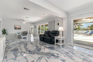 DISCOVER THE WATERFRONT LIFESTYLE YOU'VE BEEN DREAMING OF on El Rio Golf Course and Club in Florida - for sale on GolfHomes.com, golf home, golf lot