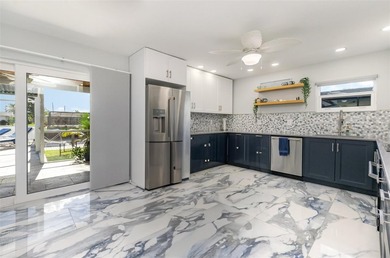 DISCOVER THE WATERFRONT LIFESTYLE YOU'VE BEEN DREAMING OF on El Rio Golf Course and Club in Florida - for sale on GolfHomes.com, golf home, golf lot