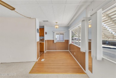 Welcome home to this charming home surrounded by majestic on Tucson Estates Golf Course in Arizona - for sale on GolfHomes.com, golf home, golf lot