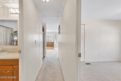 Welcome home to this charming home surrounded by majestic on Tucson Estates Golf Course in Arizona - for sale on GolfHomes.com, golf home, golf lot