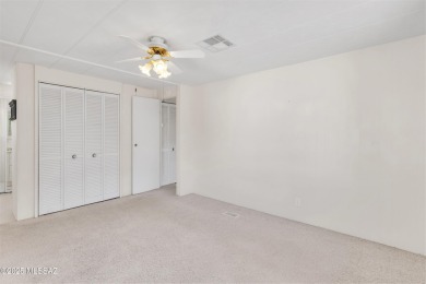 Welcome home to this charming home surrounded by majestic on Tucson Estates Golf Course in Arizona - for sale on GolfHomes.com, golf home, golf lot