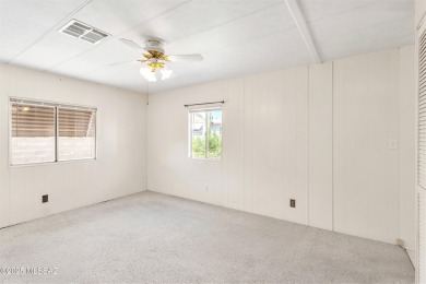 Welcome home to this charming home surrounded by majestic on Tucson Estates Golf Course in Arizona - for sale on GolfHomes.com, golf home, golf lot