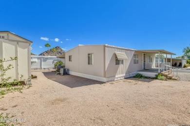 Welcome home to this charming home surrounded by majestic on Tucson Estates Golf Course in Arizona - for sale on GolfHomes.com, golf home, golf lot