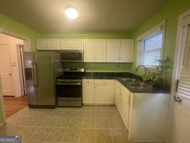 Check out this charming 3 bedroom, 1 bath bungalow in Decatur on East Lake Golf Club in Georgia - for sale on GolfHomes.com, golf home, golf lot